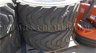 4 OUTRIGGER TIRES AND RIMS