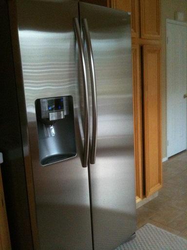 Almost brand new Samsung Refrigerator, 25 cu. ft., Side-by-Side